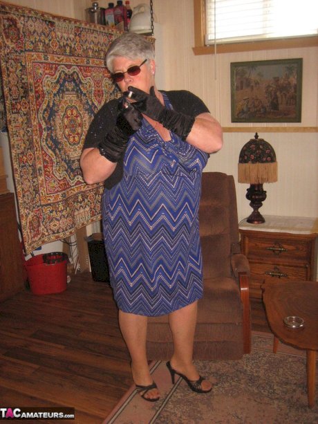 Fat granny Girdle Goddess gets naked in shades, gloves and pantyhose