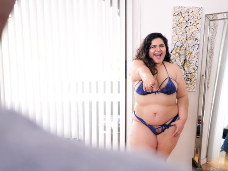 Obese Latina woman Karla Lane disrobes before a ball licking blowjob