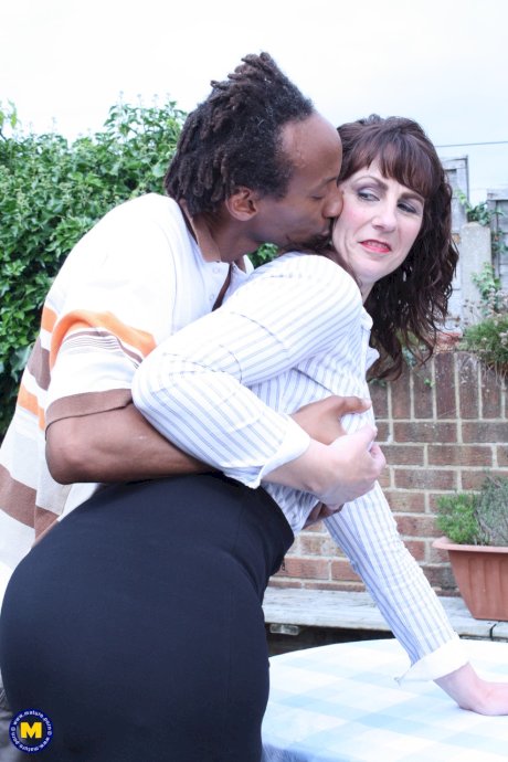 Horny British mature Toni Lace kisses a black dude and rides his huge boner