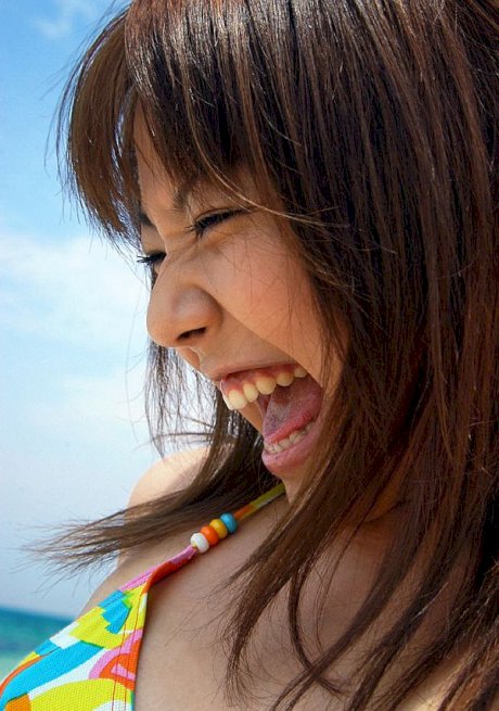 Japanese teen Chikaho Ito models non nude at the beach in a bikini