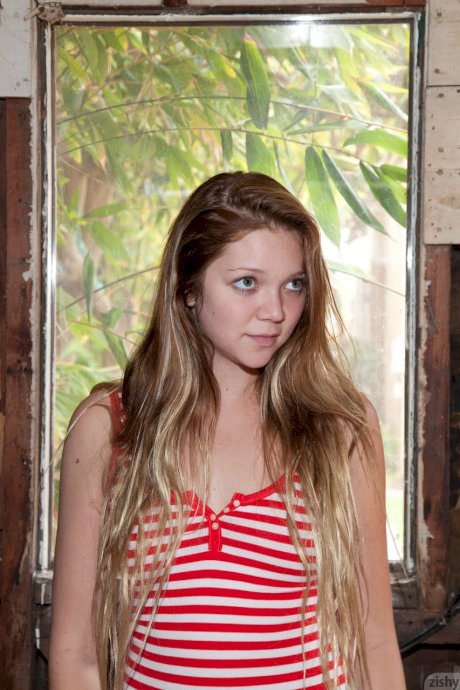 Cute teen Jessie Andrews puts sexy lipstick before posing in her hot lingerie