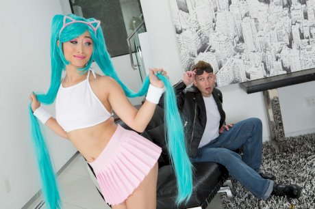 Asian cutie Ayumu Kase seduces a white boy in her cosplay outfit