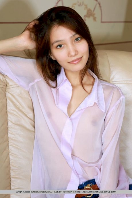Jeans clad Asian strips to squat with her legs open wide to show her clit - Photo 2