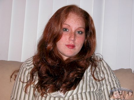 Freckled redhead with a few extra kilos on her frame makes her porn debut