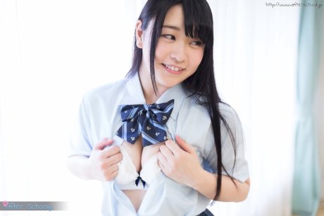 Horny Asian schoolgirl lifts up her skirt and masturbates - Photo 7