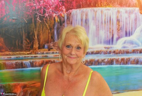 Blonde granny Sparkle looses her saggy tits from neon lingerie