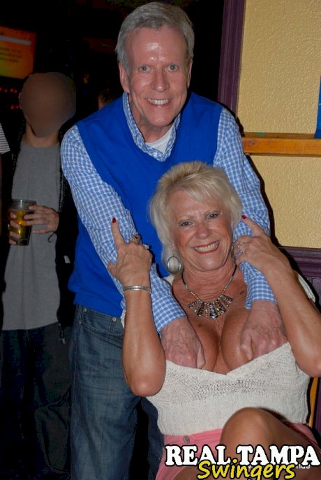 Mature lady Tracy Lick introduces her swinging friends at a party