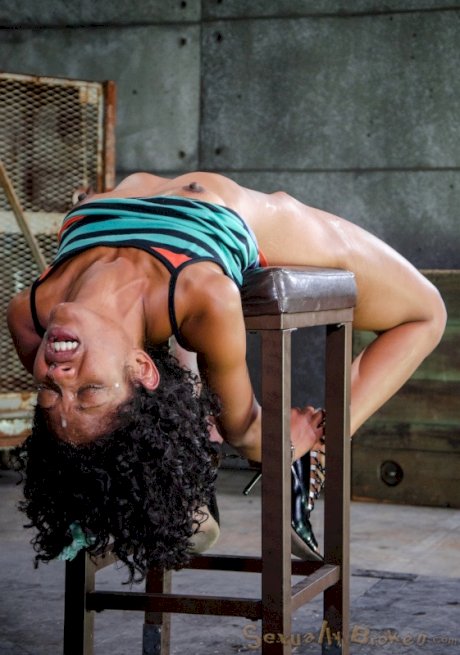 Blindfolded ebony girl Lotus Lain tied to chair for forced deepthroat & facial