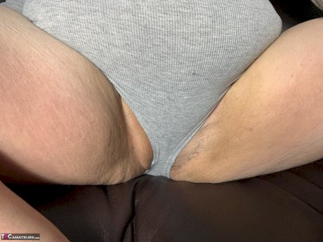 Obese amateur Sexy NE BBW shows her big ass after spreading her pussy