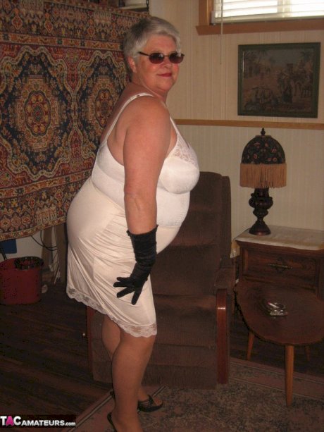 Fat granny Girdle Goddess gets naked in shades, gloves and pantyhose