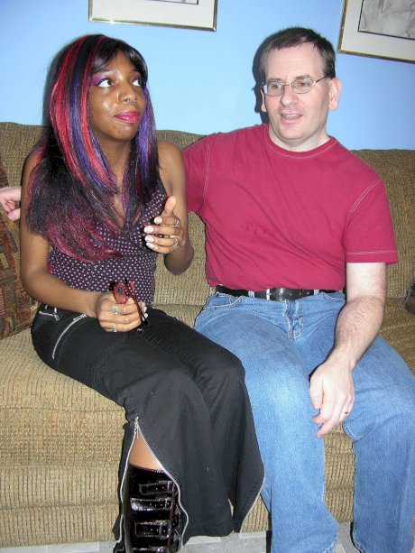 Ebony college girl ReVay strips, gets down on her knees & blows a white dick