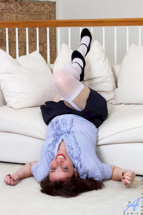 Chubby amateur Sonic strips and masturbates to orgasm with a toy on the sofa