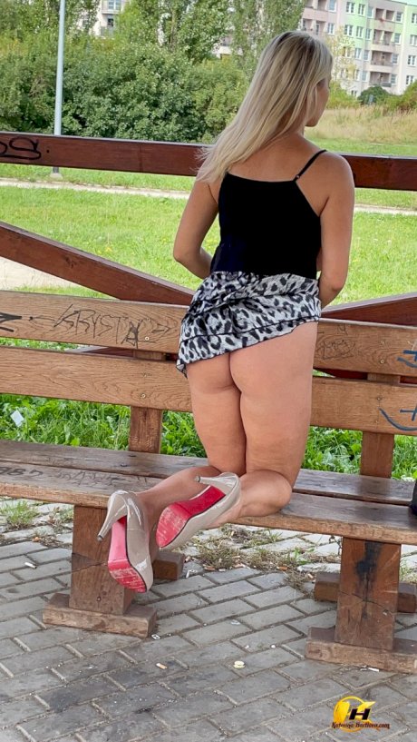 Big titted blonde Katerina Hartlova masturbates on a public bench in heels