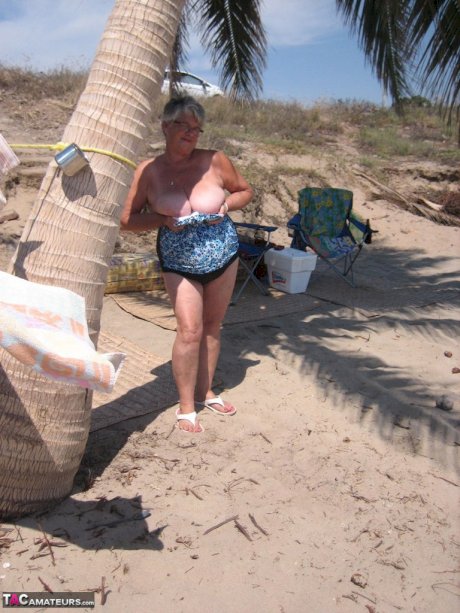 Fat granny Girdle Goddess takes off swimwear to pose nude at the ebach