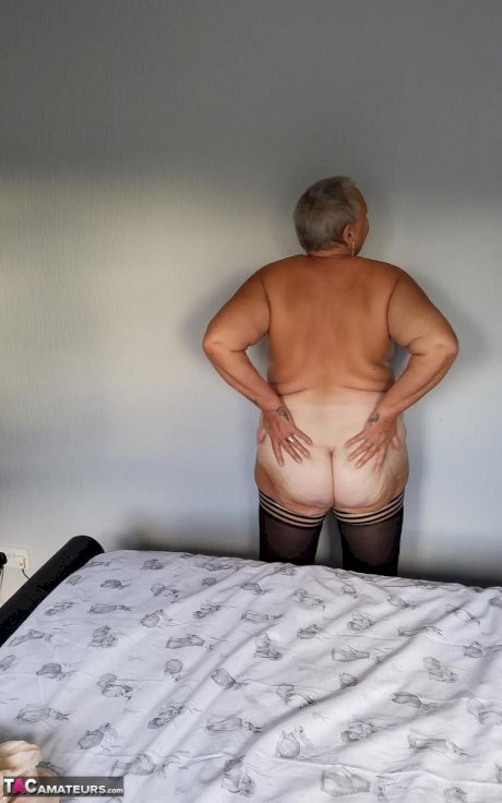 Overweight granny Valgasmic Exposed sheds her lingerie to pose nude in hosiery