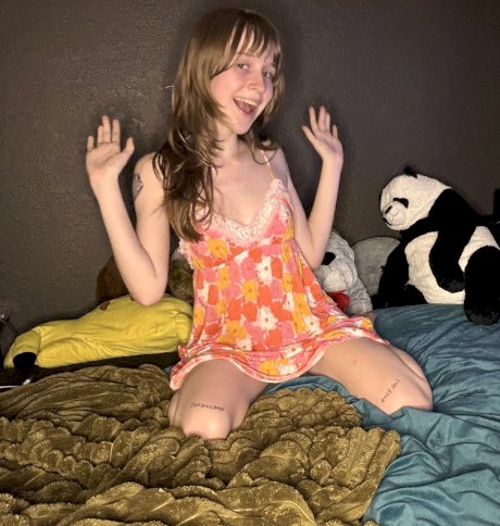 Sexy amateur teen Teensy Bella poses seductively in her nightgown