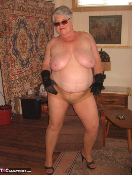 Fat granny Girdle Goddess gets naked in shades, gloves and pantyhose