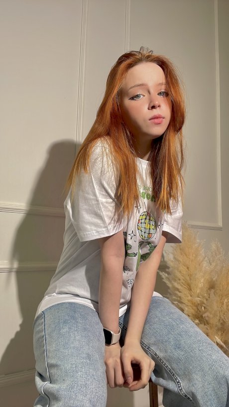 Redheaded OnlyFans teen Olash Peachy posing in her kinky compilation