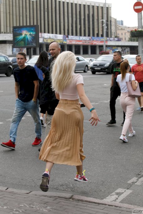 Amateur beauty Nika Nikitina flashes her panties and boobs in public - Photo 1