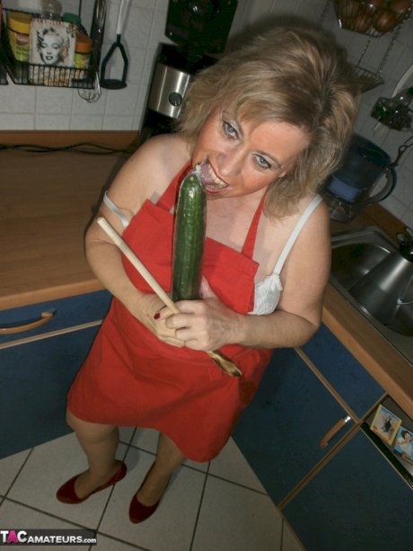 Slutty amateur housewife Caro could not resist masturbating in the kitchen