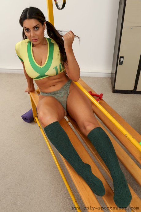 Curvy babe Charley S strips her Brazil jersey and teases with huge melons