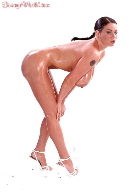 MILF Linsey Dawn McKenzie oiling huge hooters and hairy cunt in high heels - Photo 8