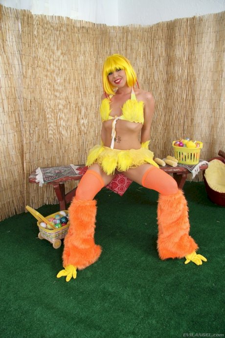 Slutty pornstar in yellow uniform Julie Night showing big tits and ass in solo