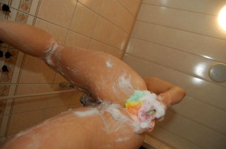 Asian MILF with ample ass Kyoko Nakano taking shower and bath