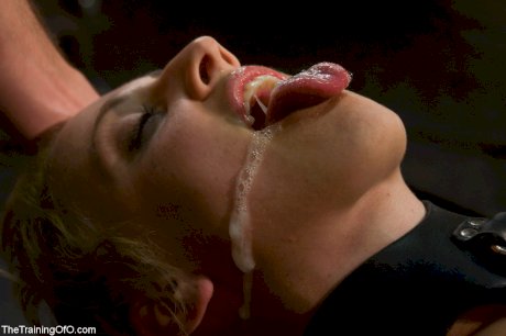 Submissive MILF Dylan Ryan gets her twat filled while tied up in BDSM action