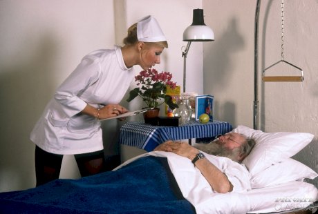 Blonde nurse Karen has sexual intercourse while attending to an old patient