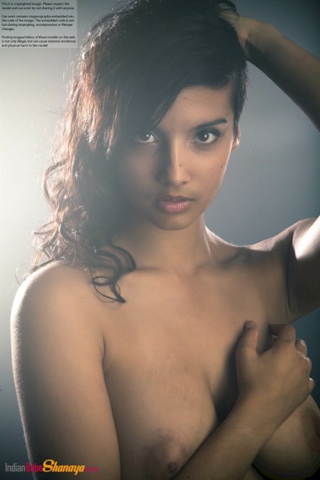 Beautiful Desi female removes her dress to expose her big natural boobs