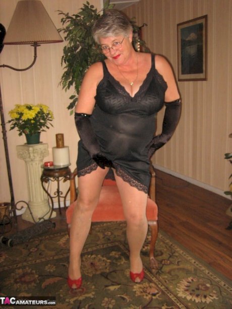 Old fatty Girdle Goddess fondles saggy tits in black velvet gloves and hose - Photo 9