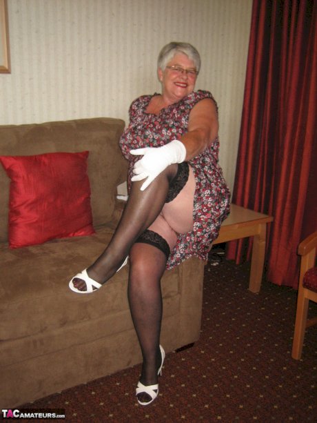 Silver haired nan Girdle Goddess bares her big tits and twat in white gloves