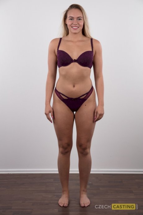 Fully clothed 18 year old Silvie stands butt naked after removing her clothes