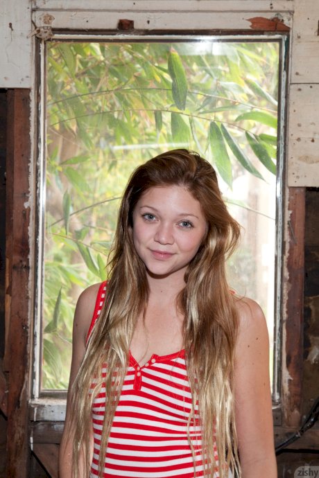 Cute teen Jessie Andrews puts sexy lipstick before posing in her hot lingerie