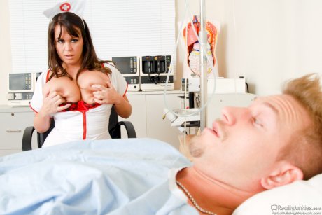 Nurse Brandy Talore takes a cumshot on her big tits after fucking a patient