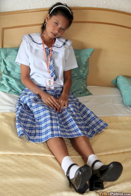 Petite Filipina schoolgirl Sally in uniform flashes panty upskirt & teen pussy