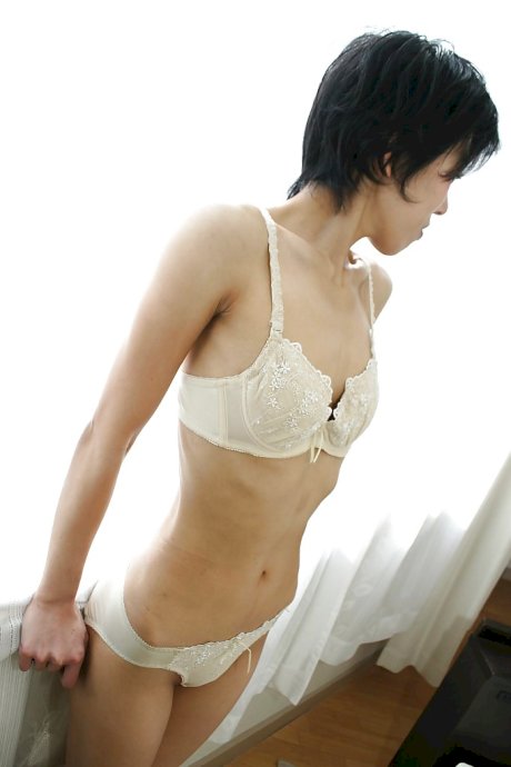 Skinny Asian milf Shinobu Funayama is undressing her lingerie