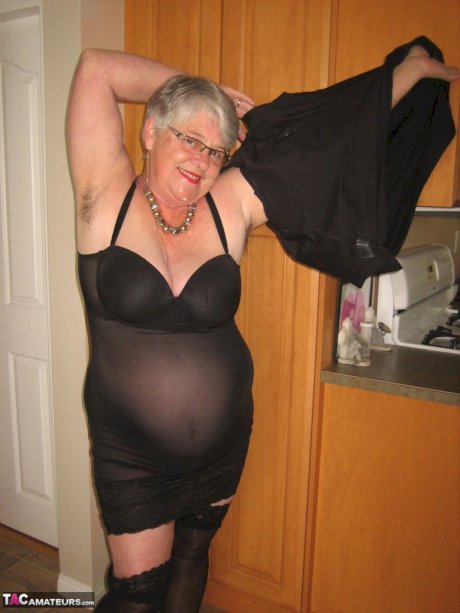 Silver haired nan Girdle Goddess looses her large tits from black lingerie