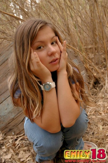 Charming 18 year old goes topless in undergrowth while wearing cute panties