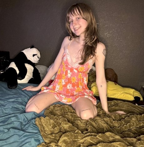Sexy amateur teen Teensy Bella poses seductively in her nightgown