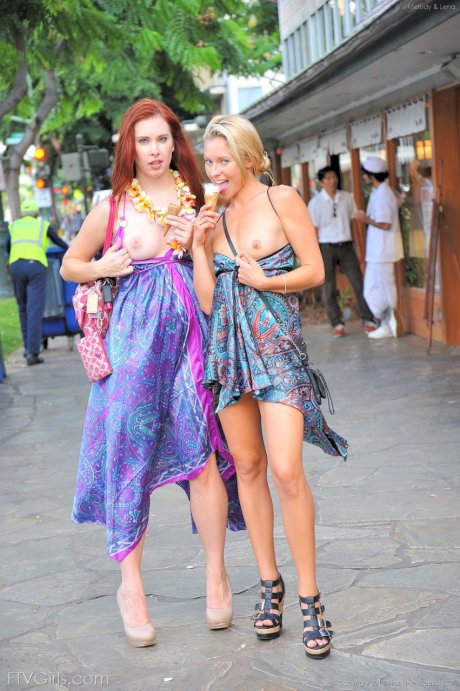 Tourists Lena and Melody exposes their tits and juicy pussies in public