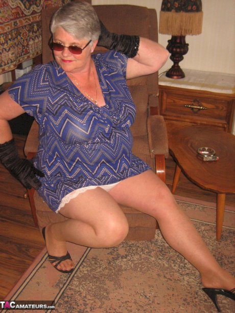 Fat granny Girdle Goddess gets naked in shades, gloves and pantyhose