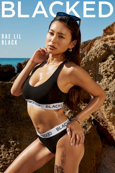 Asian hottie Rae Lil Black enjoying hardcore interracial sex on the beach