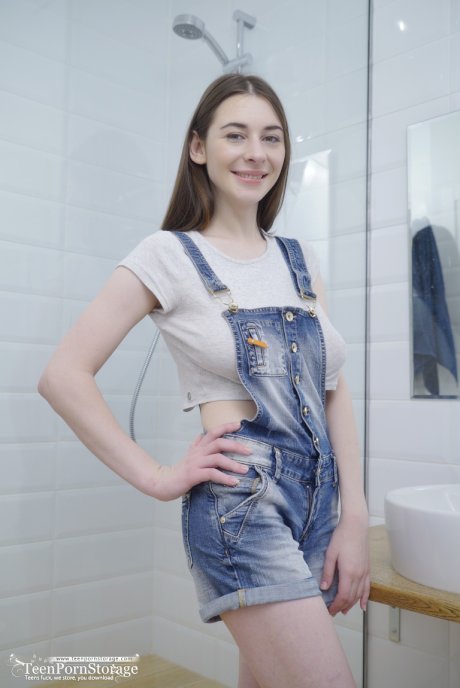 Sweet teen Clary unleashes her great boobs before masturbating in bathroom