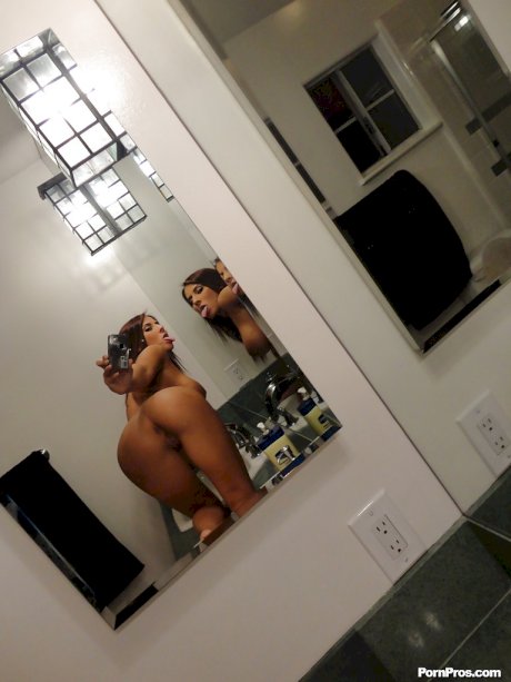 European ex-girlfriend Madison Ivy taking selfies in mirror while undressing