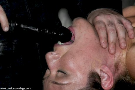 Restrained blonde slaves have her asshole masturbated by a man in dungeon - Photo 9