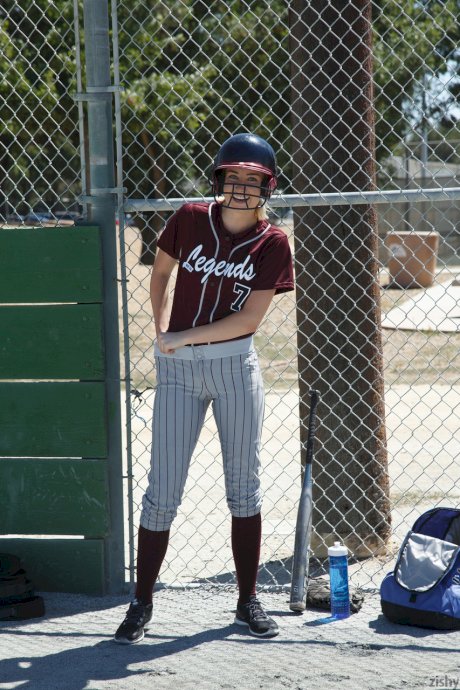 Sporty blonde Morgan Attwood flashing tiny tits & hot ass in a softball field