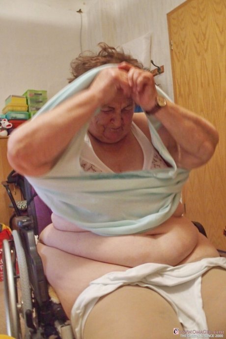 Chubby granny Aloysia plays with her saggy tits while undressing