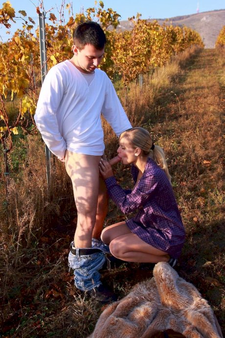 Blonde girl and her boyfriend have sex on the ground on an autumn day porn pics